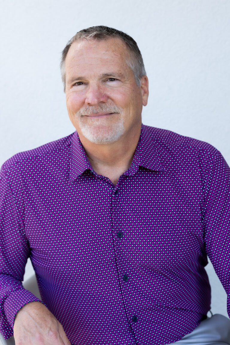 Mike in a cool purple shirt